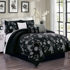 7-Piece Elegant Black and White Floral Embroidered Comforter Set, styled on a made bed
