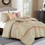 Beige floral embroidered 7-piece comforter set arranged on a bed