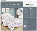 Modern Botanical Purple and Pink 7-Piece Complete Bedding Ensemble, shown in a bedroom setting