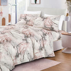 Blush & Grey Marble sheet set on a bed