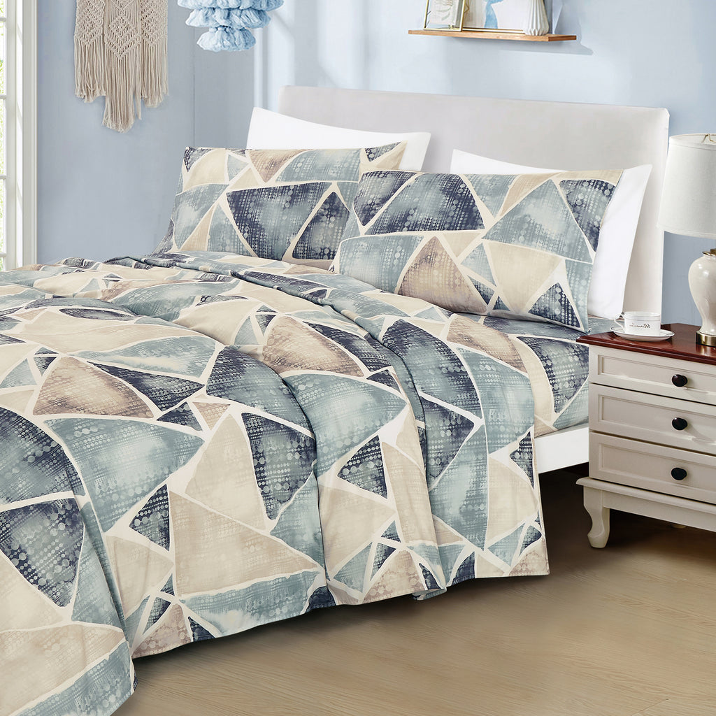 Blue & Taupe Geometric sheet set on a bed